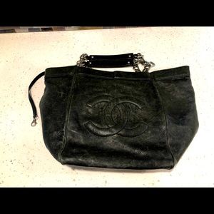Authentic Chanel black bag with silver chains.